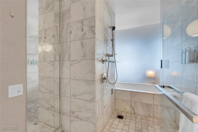 full bathroom featuring tiled shower