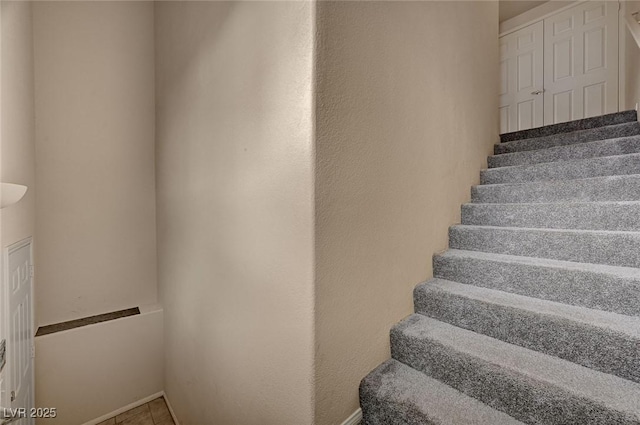 staircase with baseboards
