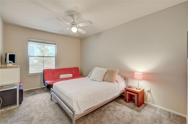 bedroom with carpet flooring, baseboards, and ceiling fan