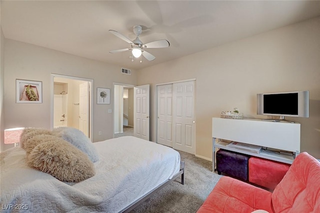bedroom with a closet, visible vents, ceiling fan, carpet floors, and baseboards
