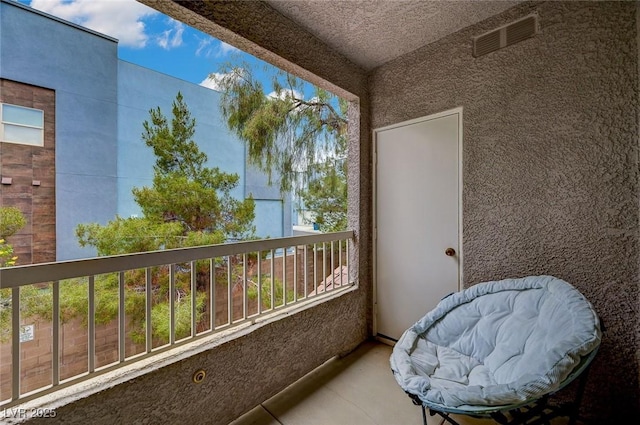 balcony featuring visible vents