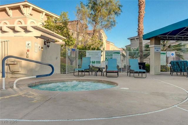 view of pool with fence