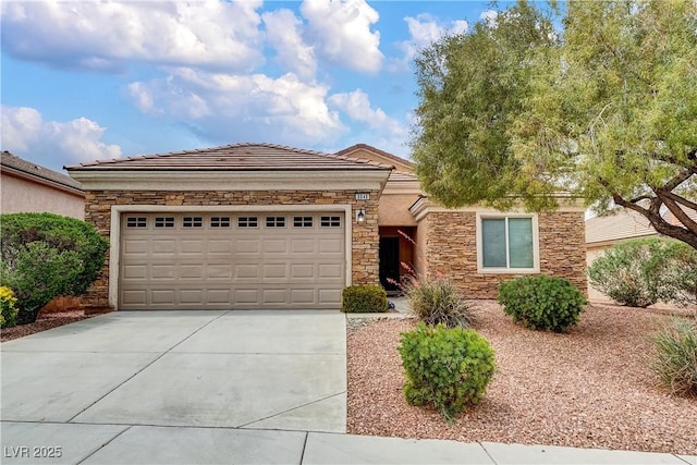 single story home featuring concrete driveway, a garage, and stone siding