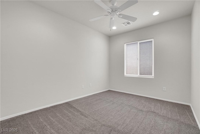 spare room featuring visible vents, recessed lighting, ceiling fan, carpet flooring, and baseboards