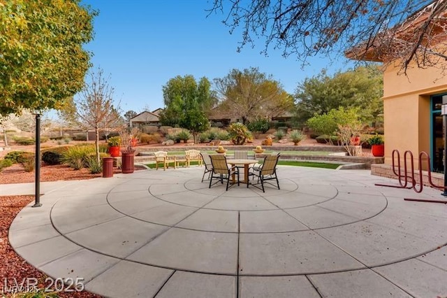 view of patio with outdoor dining area