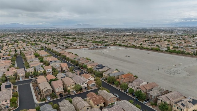 aerial overview of property's location with nearby suburban area