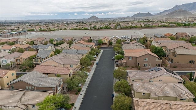 aerial perspective of suburban area featuring a mountainous background