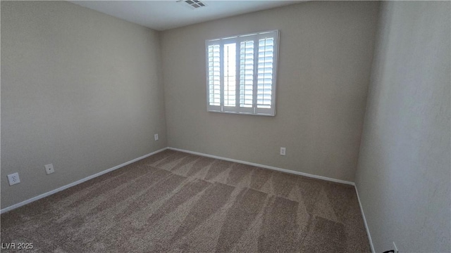 carpeted empty room with baseboards and visible vents