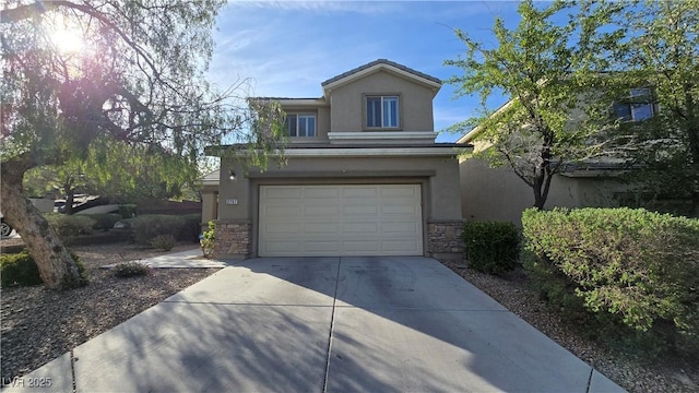 view of front facade featuring concrete driveway, a garage, stucco siding, and stone siding