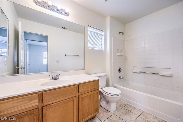 full bathroom with shower / bathtub combination, toilet, visible vents, tile patterned flooring, and vanity