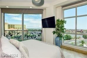 9101 Alta Dr Unit 507, Las Vegas, NV 89145 - bedroom featuring multiple windows