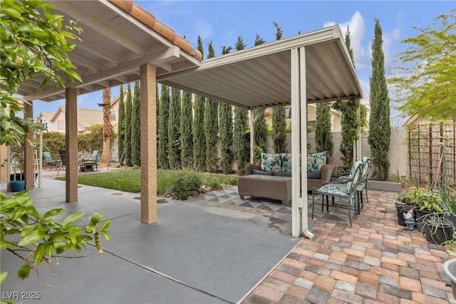 view of patio / terrace featuring outdoor lounge area and a fenced backyard