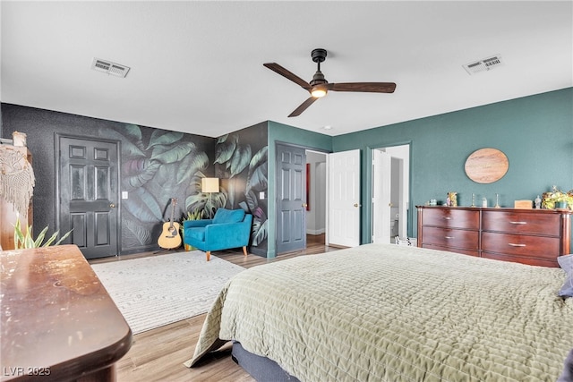 bedroom with wood finished floors and ceiling fan