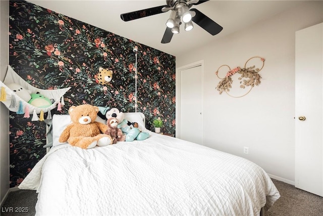 bedroom with carpet, baseboards, and ceiling fan