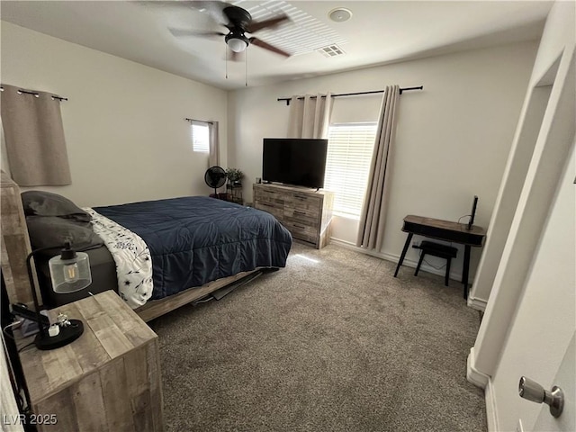 bedroom with carpet, baseboards, and ceiling fan