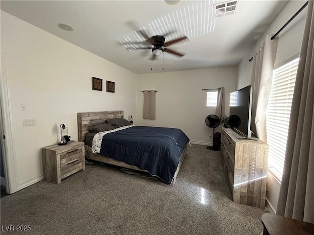 bedroom featuring baseboards and ceiling fan