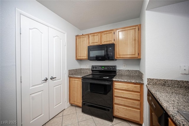 5055 W Hacienda Ave Unit 1097, Las Vegas, NV 89118 - kitchen with black appliances, light tile patterned floors, light brown cabinetry, and dark stone countertops