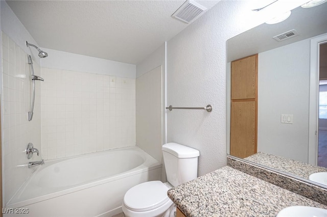 5055 W Hacienda Ave Unit 1097, Las Vegas, NV 89118 - full bathroom featuring a textured wall, toilet, shower / tub combination, vanity, and a textured ceiling