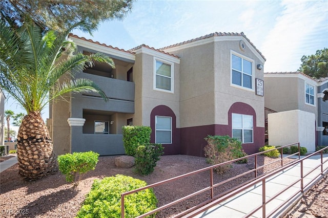5055 W Hacienda Ave Unit 1097, Las Vegas, NV 89118 - multi unit property with stucco siding and a tiled roof