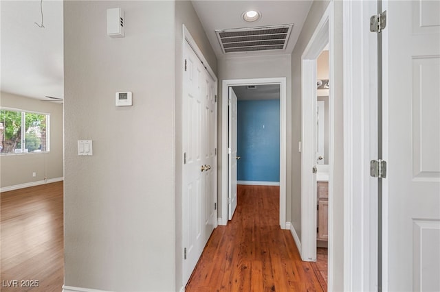 4517 Rodman Dr, Las Vegas, NV 89130 - corridor featuring light wood-style flooring, baseboards, and recessed lighting