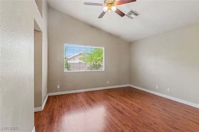 4517 Rodman Dr, Las Vegas, NV 89130 - unfurnished room with wood finished floors, ceiling fan, vaulted ceiling, and baseboards