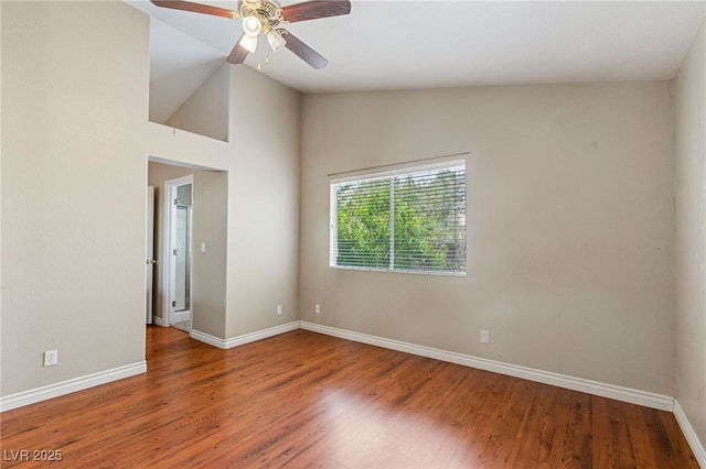 4517 Rodman Dr, Las Vegas, NV 89130 - spare room featuring a ceiling fan, baseboards, wood finished floors, and vaulted ceiling