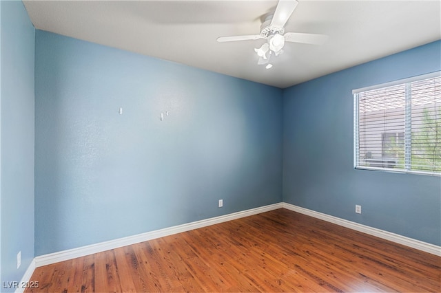 4517 Rodman Dr, Las Vegas, NV 89130 - empty room with baseboards, wood finished floors, and ceiling fan