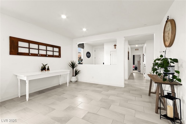 corridor featuring recessed lighting