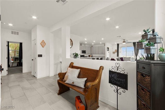 living area featuring recessed lighting