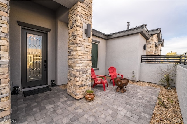 5865 Alice Landing Ct, Las Vegas, NV 89149 - property entrance featuring stucco siding, a patio, and fence