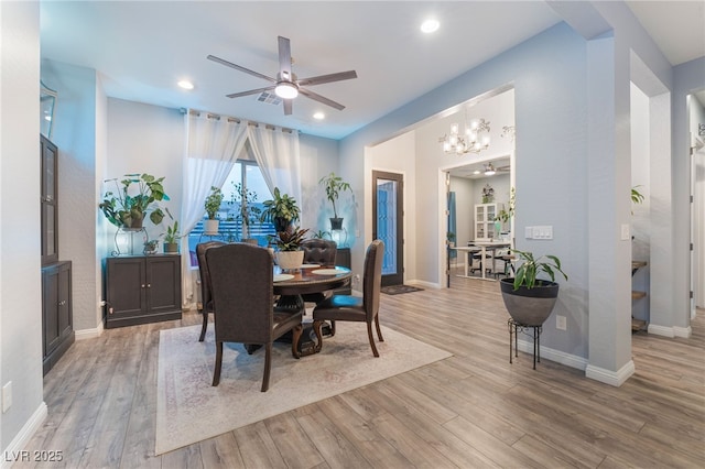 5865 Alice Landing Ct, Las Vegas, NV 89149 - dining space with ceiling fan, wood finished floors, a chandelier, baseboards, and recessed lighting
