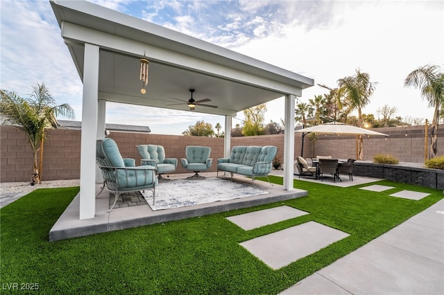 5865 Alice Landing Ct, Las Vegas, NV 89149 - view of yard with outdoor lounge area, ceiling fan, and a patio area