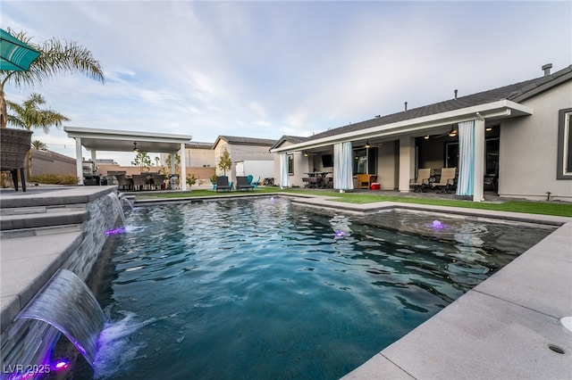 5865 Alice Landing Ct, Las Vegas, NV 89149 - view of swimming pool with a patio area, a ceiling fan, and outdoor dining area