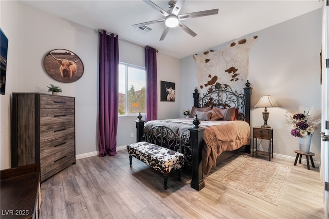 5865 Alice Landing Ct, Las Vegas, NV 89149 - bedroom with light wood-type flooring, baseboards, and a ceiling fan