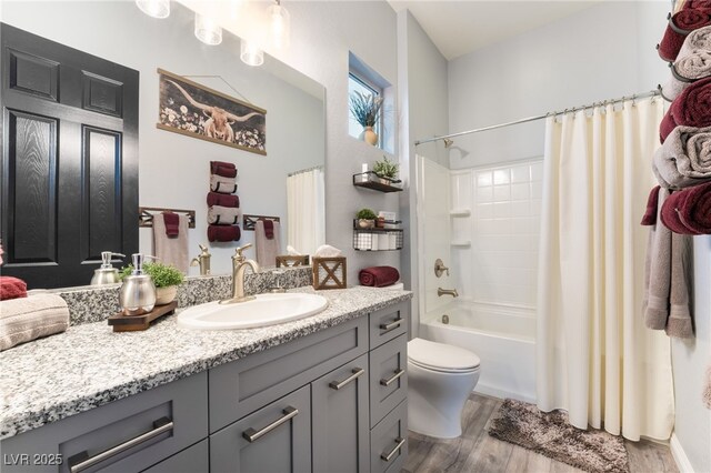 5865 Alice Landing Ct, Las Vegas, NV 89149 - bathroom featuring wood finished floors, vanity, toilet, and shower / tub combo
