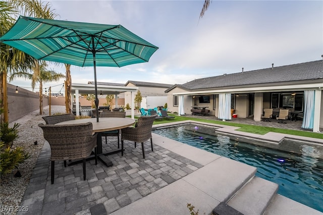 5865 Alice Landing Ct, Las Vegas, NV 89149 - swimming pool featuring outdoor dining area, a patio, and a fenced backyard