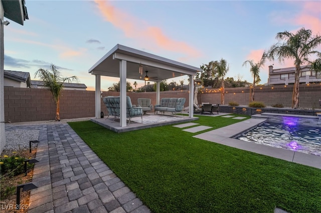 5865 Alice Landing Ct, Las Vegas, NV 89149 - view of yard featuring outdoor lounge area, a ceiling fan, and a patio area