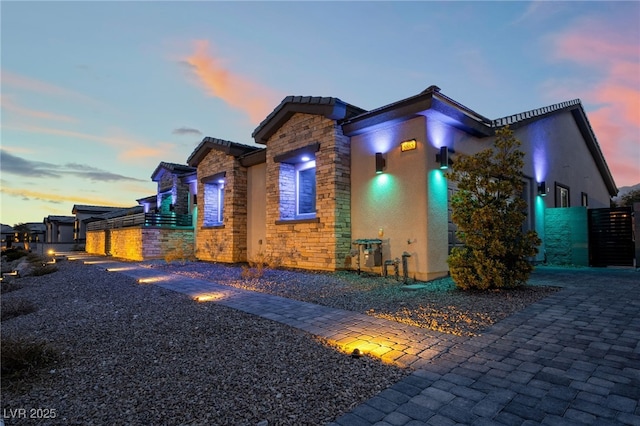 5865 Alice Landing Ct, Las Vegas, NV 89149 - modern home featuring stone siding and stucco siding
