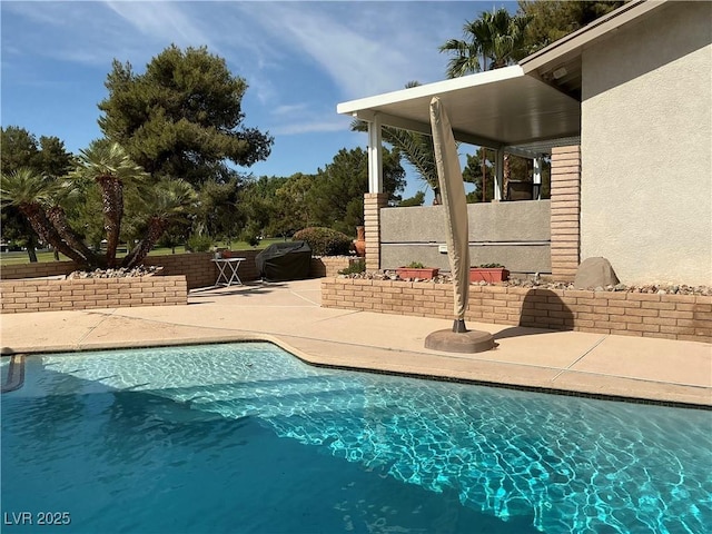 893 Fairway Dr, Boulder City, NV 89005 - outdoor pool featuring a patio and fence