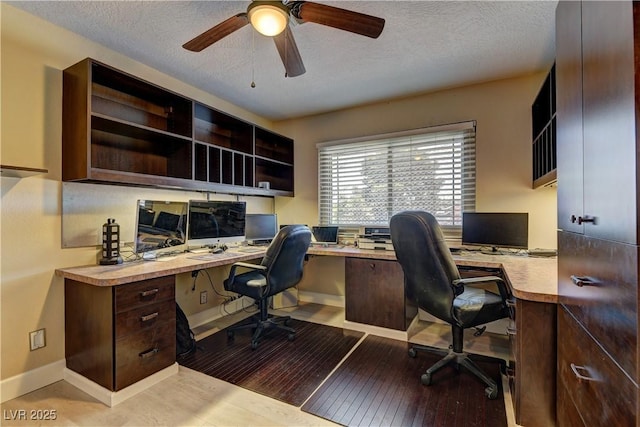 893 Fairway Dr, Boulder City, NV 89005 - office space with built in desk, ceiling fan, baseboards, hardwood / wood-style flooring, and a textured ceiling