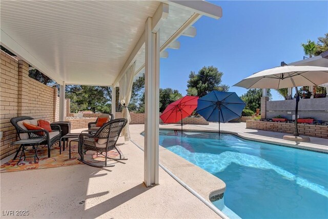 893 Fairway Dr, Boulder City, NV 89005 - view of pool with a patio, fence, and outdoor lounge area