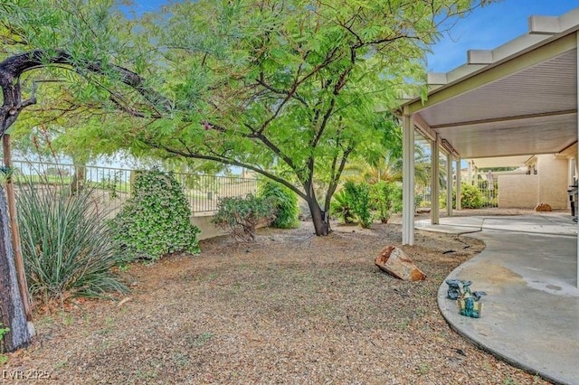 fenced backyard featuring a patio area