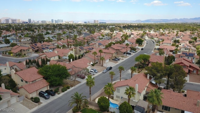 aerial overview of property's location with nearby suburban area