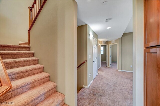 11420 Ogden Mills Dr Unit 101, Las Vegas, NV 89135 - stairs with carpet flooring, baseboards, and recessed lighting