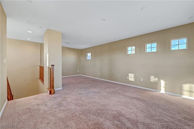 11420 Ogden Mills Dr Unit 101, Las Vegas, NV 89135 - below grade area with carpet floors, plenty of natural light, baseboards, and recessed lighting