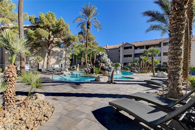 community pool featuring a patio