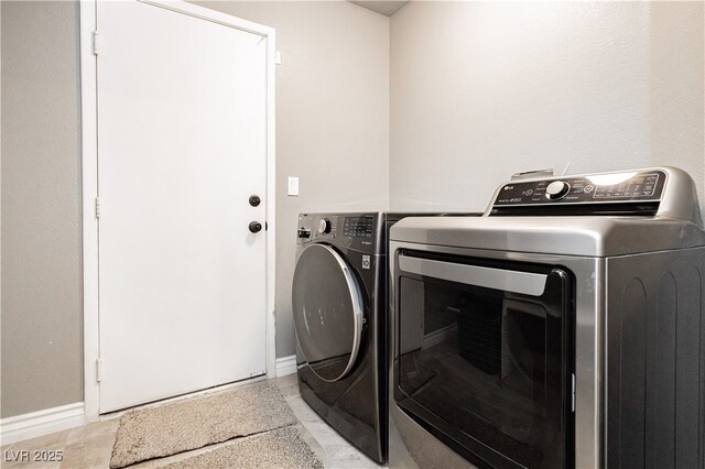 434 Viewmont Dr, Henderson, NV 89015 - laundry room with washing machine and clothes dryer and baseboards