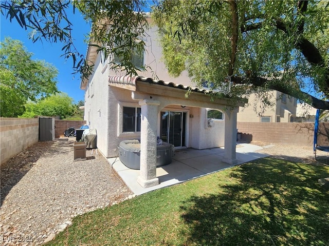 10400 Beachwalk Pl, Las Vegas, NV 89144 - rear view of property with stucco siding, a fenced backyard, and a patio area