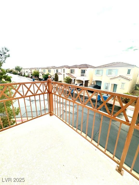 balcony featuring a residential view