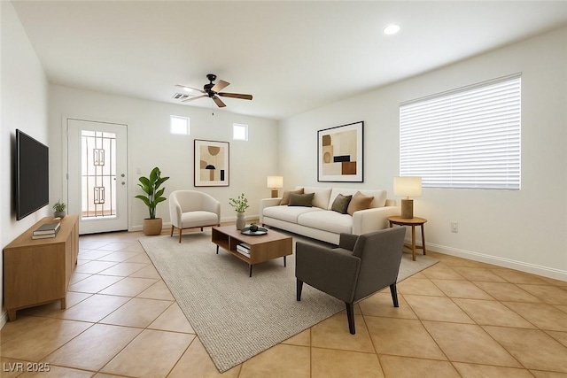 10372 Beautiful Fruit St, Las Vegas, NV 89183 - living area featuring light tile patterned flooring, ceiling fan, recessed lighting, and baseboards
